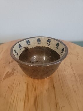 Stonewear Bowl With Deer Track Decorations.